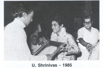 Lalgudi G.Jayaraman conferring the spl.award to Mandolin U.Srinivas in the International year of Youth in the year 1985.