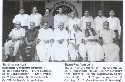 The Office Bearers & Managing Committee Members of Sri Krishna Gana Sabha in he Swarna Jayanthi Year -2004 Standing from Left (Managing Committee Members): Sri Ravi Appaswamy, Sri N.kamakodi, Sri D.Gopalakrishnan, Sri Y.Prabhu, Sri V.Devanathan, Sri R.Radhakrishnan, Sri TS Sridhar, Sri N.Venkatesh Sitting Row from Left: Sri S.Ramasubramaniam(Jt.Secretary), Sri R.Thyagarajan (Treasurer), Sri V.V.Sundaam, (Vice President), Sri Nalli Kuppuswami Chetti (President ) , Sri R.yagnaraman (General Secretary, Sri R.Venkateswaran (Joint Secretary)