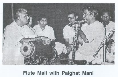 Performance by Flute Mali with Palghat Mani Iyer.