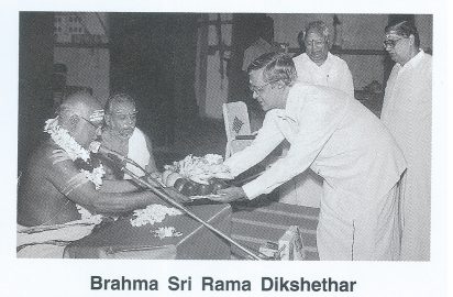 Y.Prabhu honouring Brahmasri Rama Dikshithar .Dr.Nalli look on.