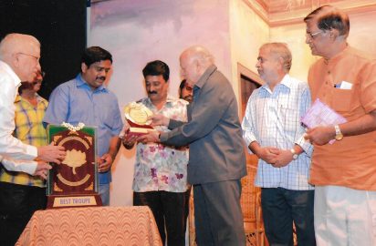 Chithirai Nataka Vizha-12.04.2014-N.Ram ,Chairman , Kasturi & Sons presenting Poornam New Theatres rolling trophy for best drama troupe to Augusto Creations and Augusto receives on behalf of the troupe.Y.Prabhu look on